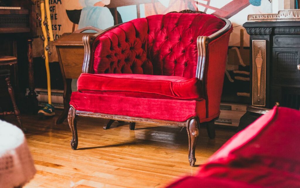 Red velvet chair in a study Dark Academic Decor