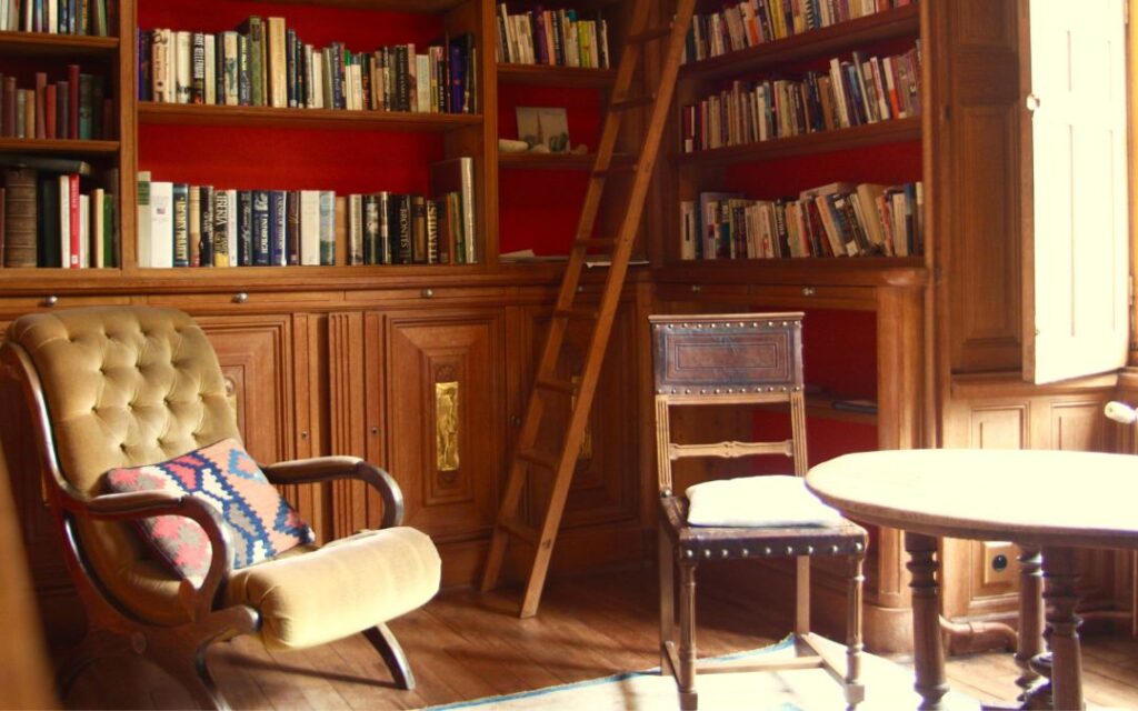 Dark Academic Decor with velvet chair and books